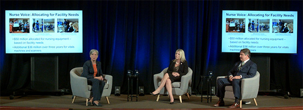 Dr. Jane Englebright, Jen Berres, and Ed Jones on stage at the town hall